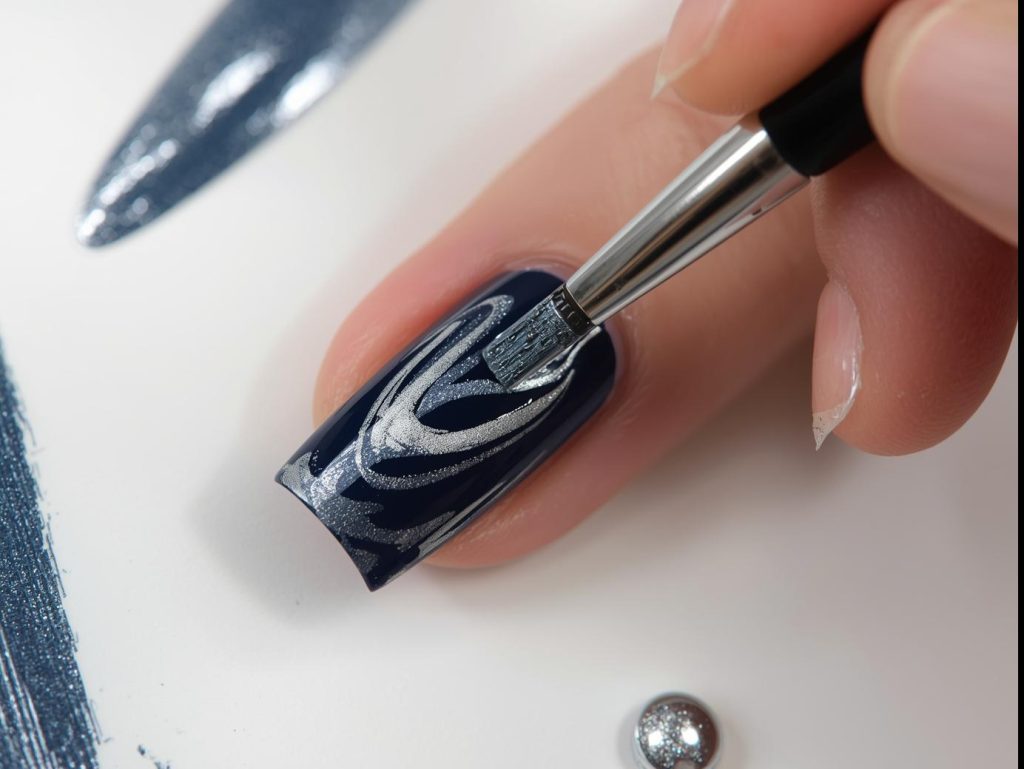 Creating deep navy and silver swirl marble nails with swirled polish.