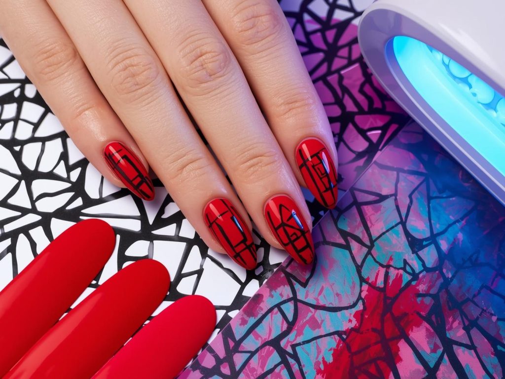 DIY Gel Nails: Stunning and Pinterest-Worthy Manicures to Adore 11 Classic red black geometric DIY gel nail art with glossy finish