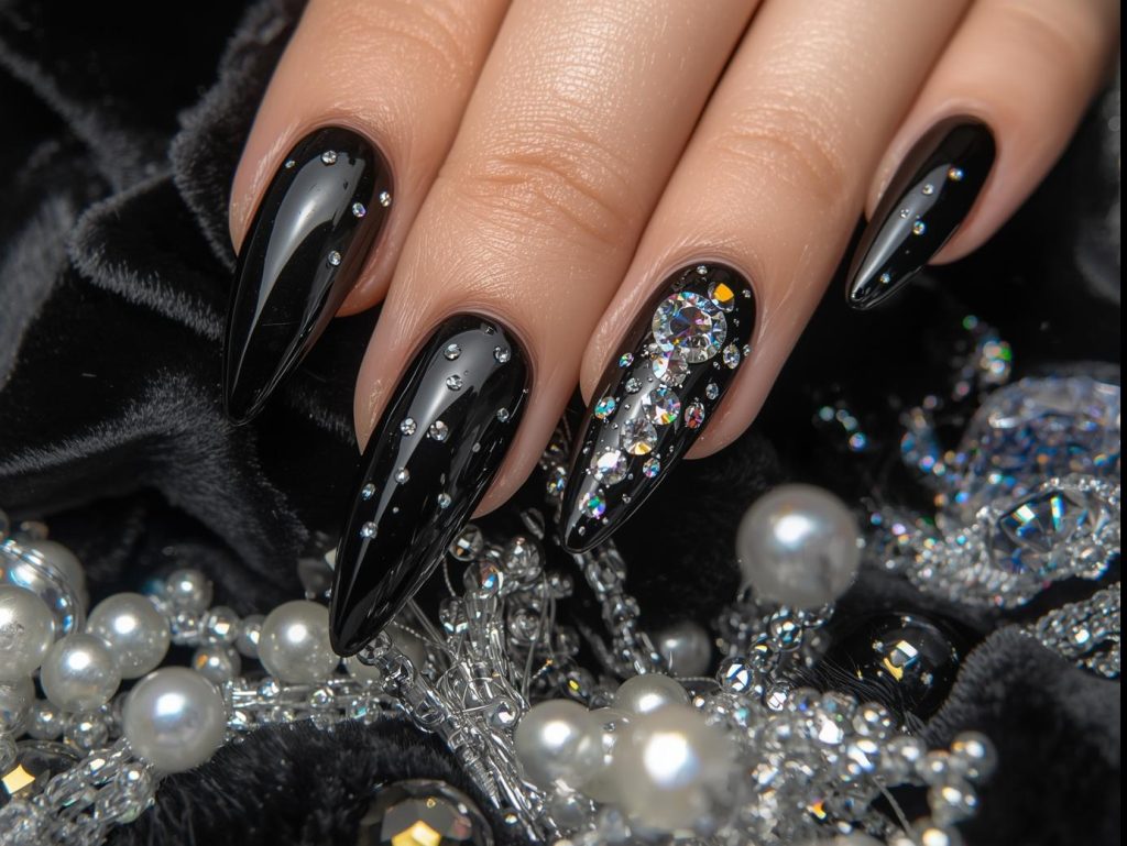 Holographic crystal accent nail art with midnight black base.