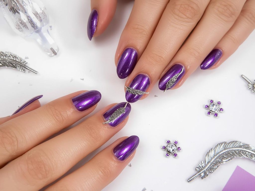 Festival Nail Designs: Vibrant and Pinterest-Worthy Manicures to Adore 12 Creating glossy purple silver metallic feather nail art with silver charms.