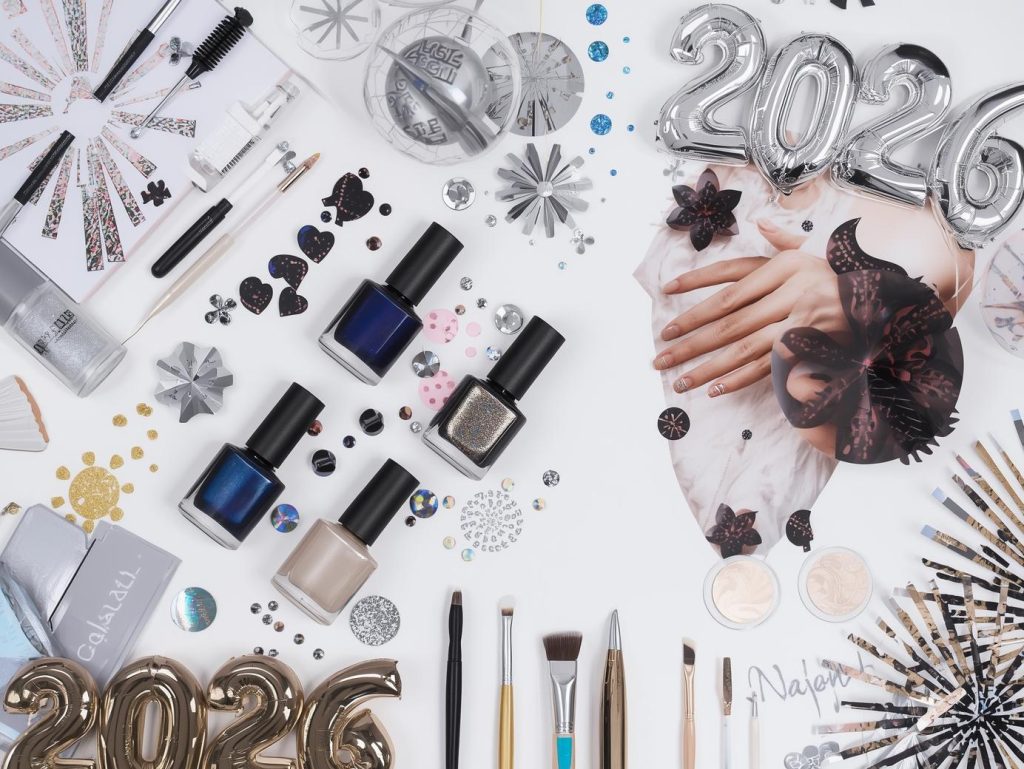 Nail art kit with polish and tools for New Year 2026 nail designs.