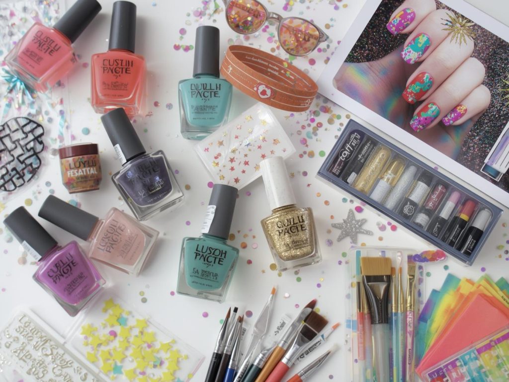 Festival Nail Designs: Vibrant and Pinterest-Worthy Manicures to Adore 13 Nail art kit with polish and tools for festival nail designs.