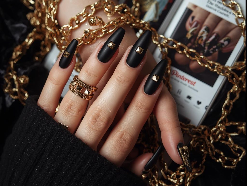 Raised gold stud 3D nail art design with matte black base on a Pinterest board.