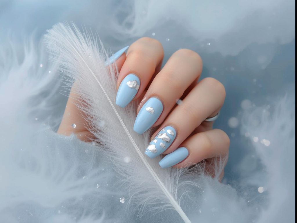 Sky Blue Nail Designs: Serene and Pinterest-Worthy Manicures to Adore 3 Soft sky blue silver cloud nail design with sky blue base on a Pinterest board.
