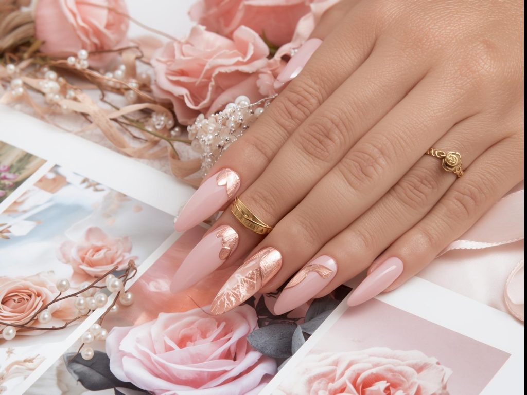  Soft blush pink rose gold foil petal nail design with blush pink base on a Pinterest board.