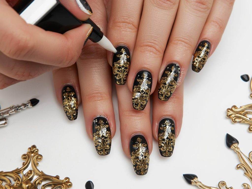 Creating rich black gold foil baroque nail art with gold foil.