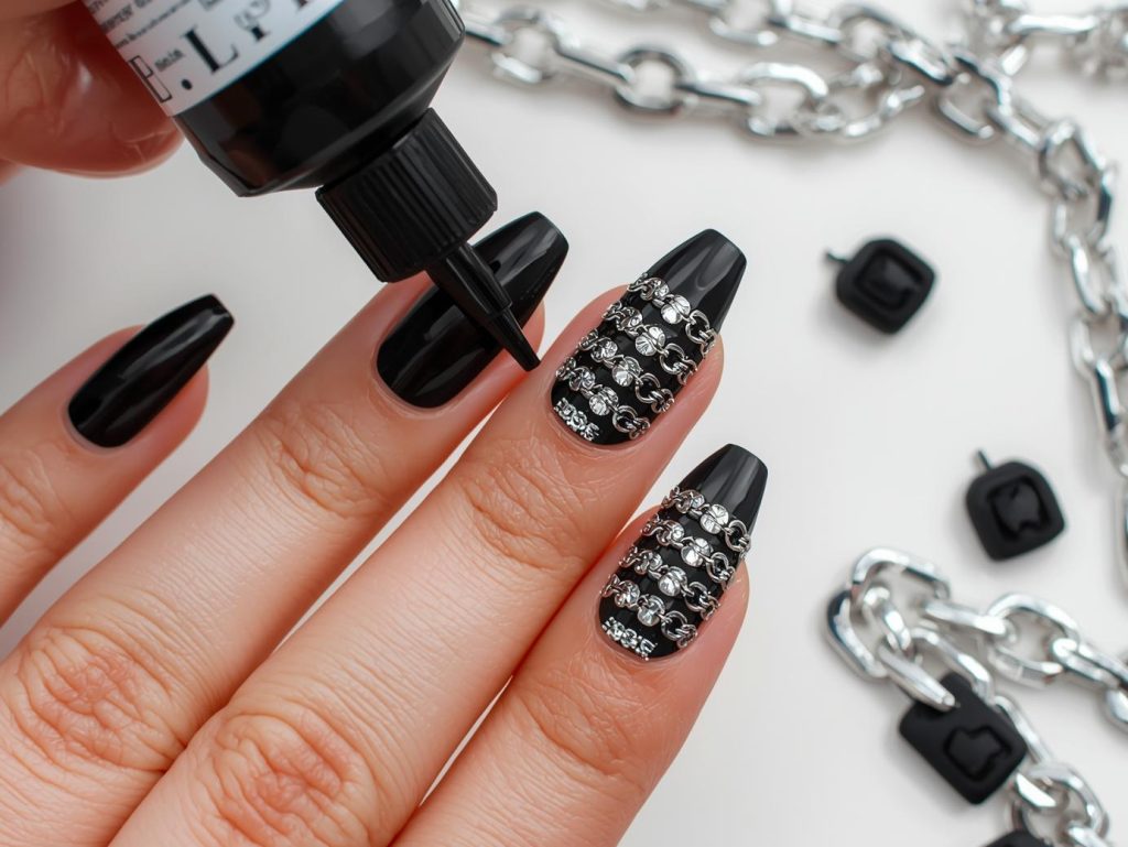 Creating jet black chrome silver chain nail art with chrome silver accents.