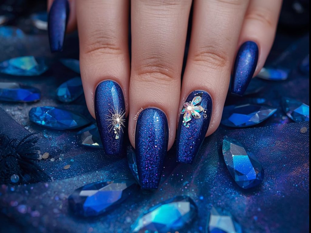 Iridescent aurora borealis crystal nail art with deep sapphire base.