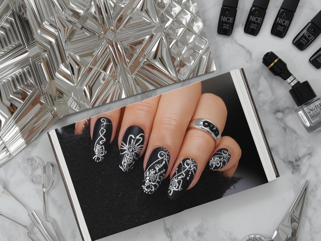 Matte black silver chrome abstract nail art in a nail artist portfolio.