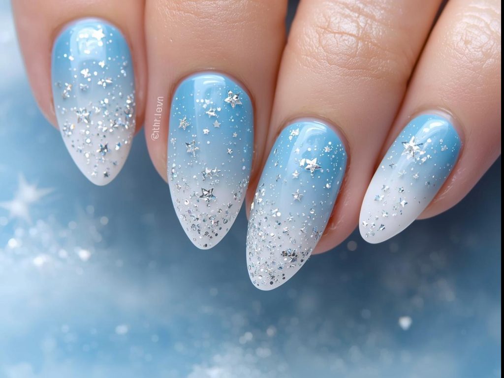 Sky Blue Nail Designs: Serene and Pinterest-Worthy Manicures to Adore 7 Sky blue ombre nail art with glittery star sparkles