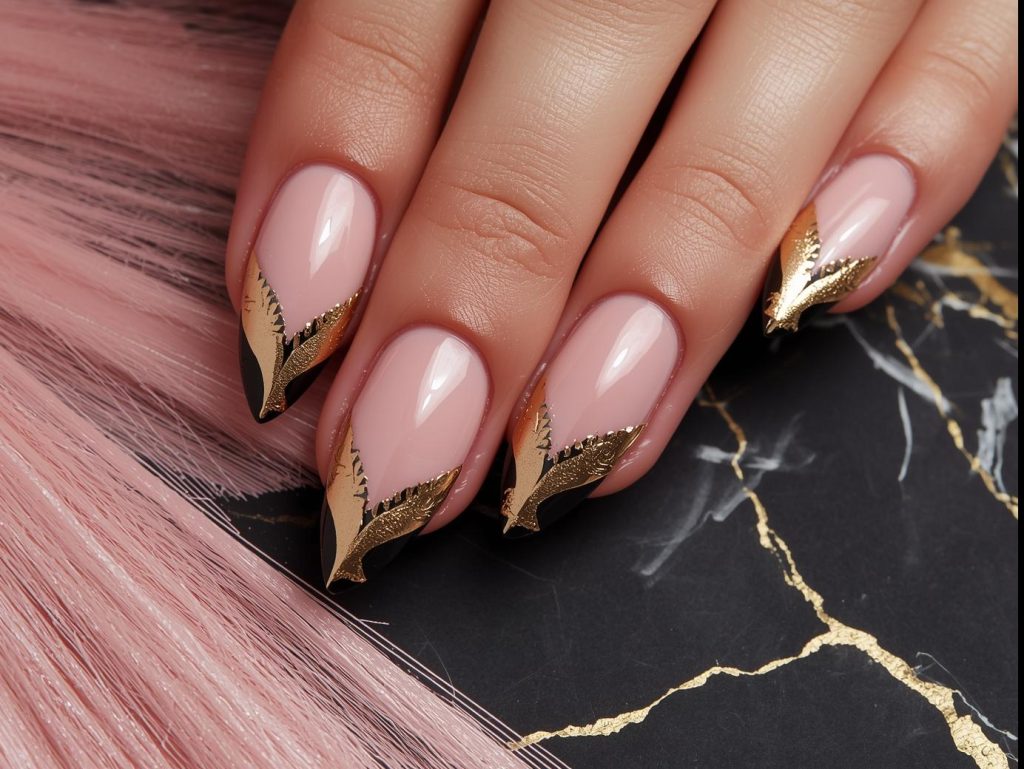 Gold French tip nail art with black marble accents