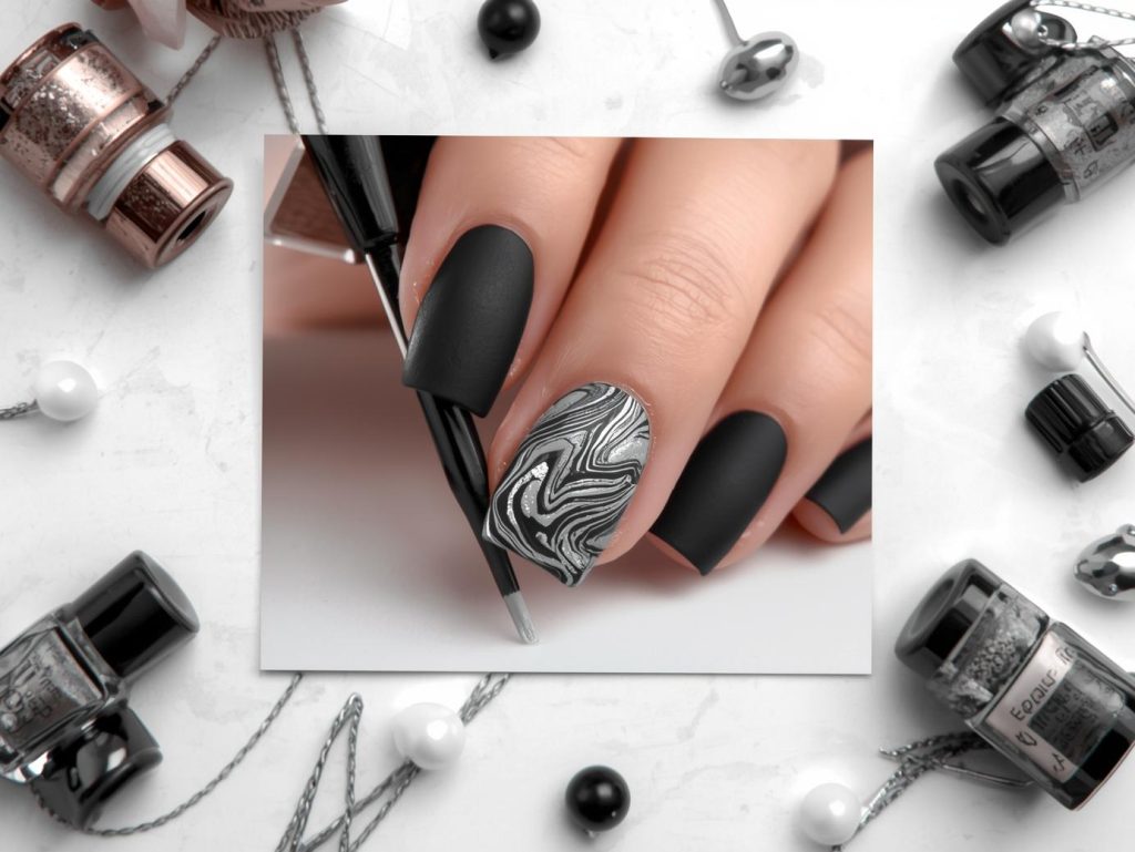 Creating matte black silver marble DIY acrylic nail art with silver marble effects.