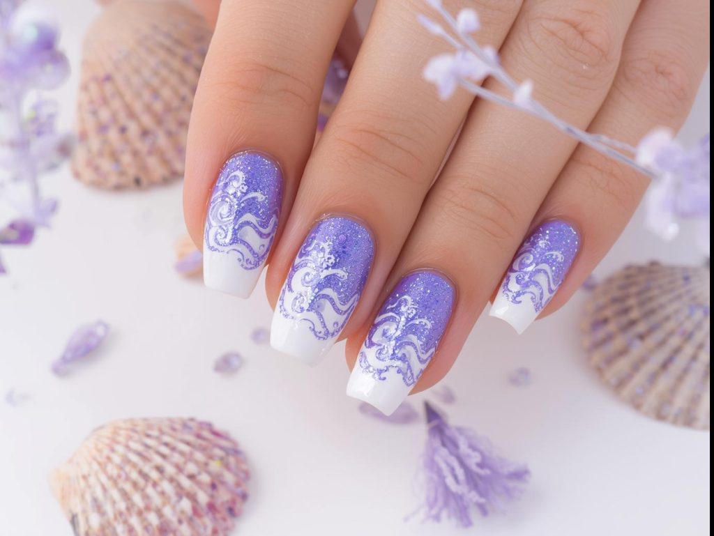 Mermaid Nail Designs: Enchanting and Pinterest-Worthy Manicures to Adore 8 Creating iridescent purple and blue ombre mermaid nail art with glitter waves.