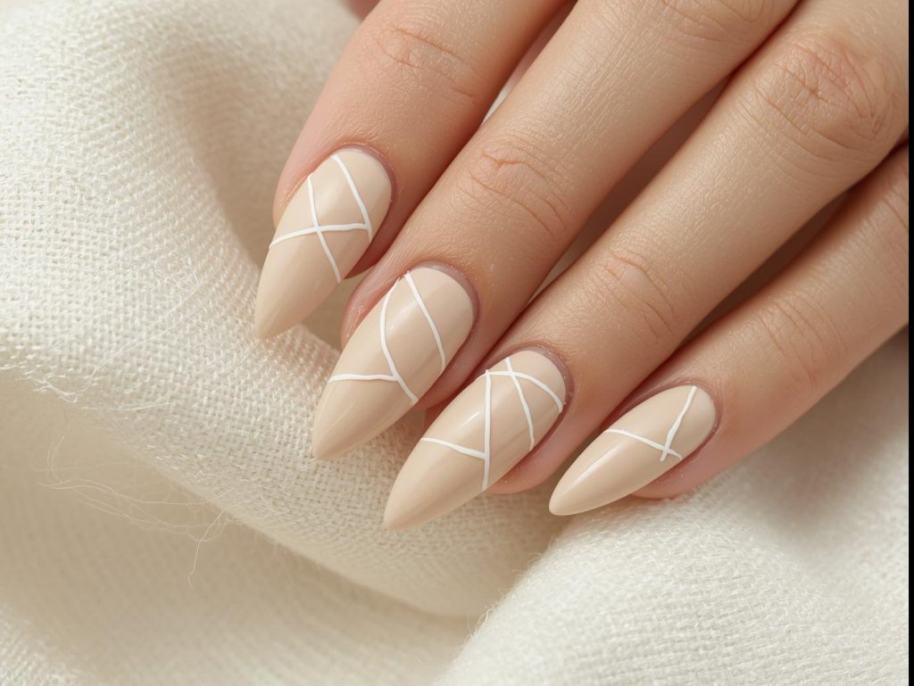 Beige Nail Designs: Elegant and Pinterest-Worthy Manicures to Adore 9 Creamy beige minimalist line nail art with white patterns.