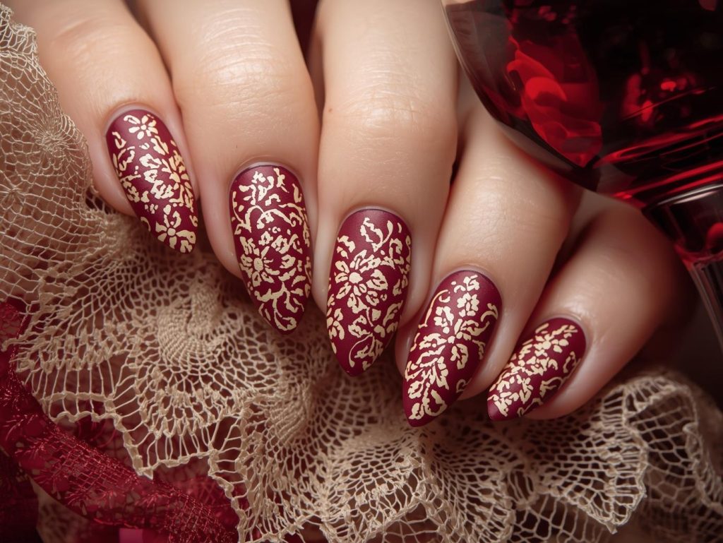  Rich burgundy creamy beige lace nail art with beige patterns.