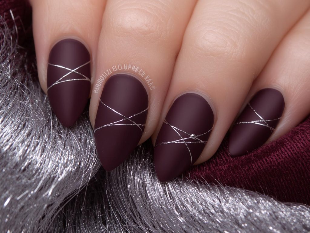 Deep plum silver minimalist line nail art with silver patterns