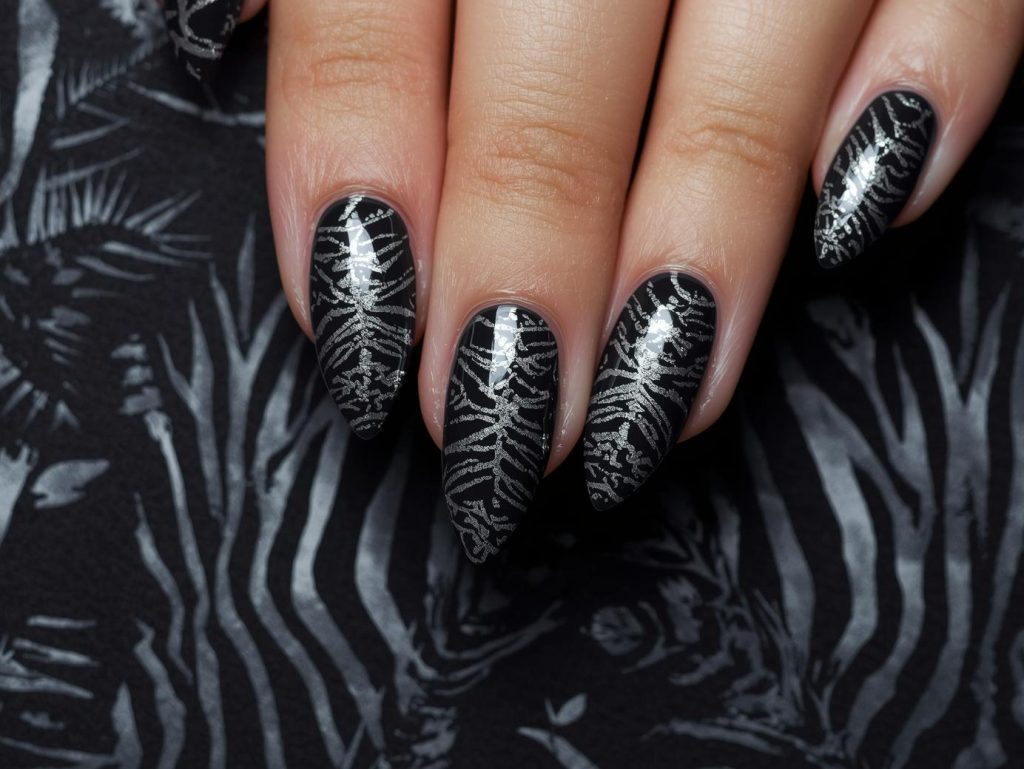 Zebra Print Nail Designs: Bold and Pinterest-Worthy Manicures to Adore 9 Deep charcoal silver zebra nail art with silver patterns.