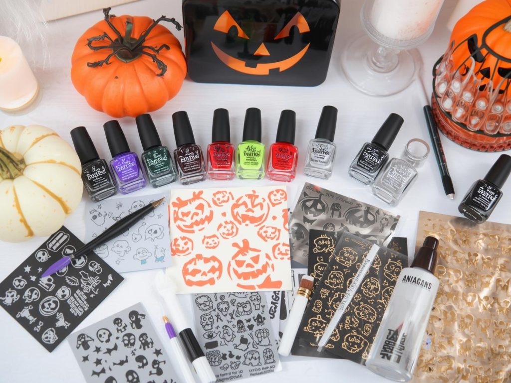 Halloween nail art kit with polish and tools for spooky nail designs.