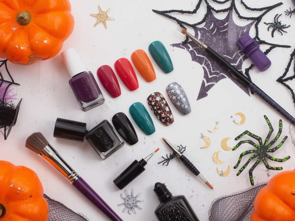 Halloween nail color kit with polish and tools for spooky, vibrant designs.