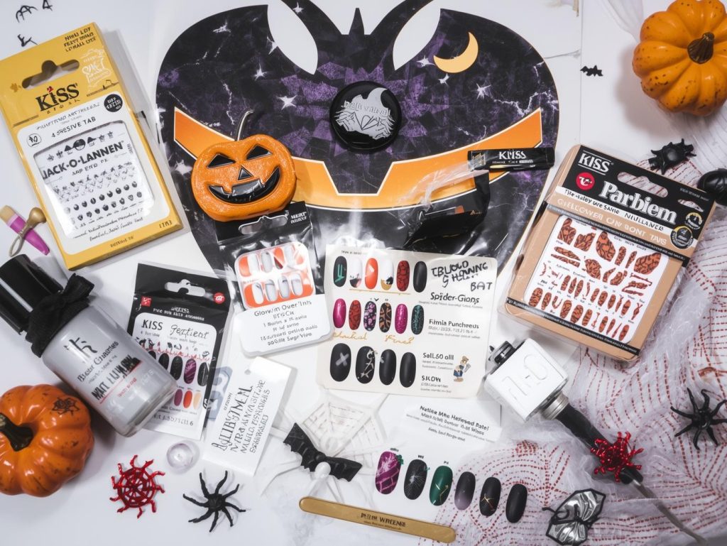 Kiss Halloween nail kit with press-ons and tools for spooky designs.