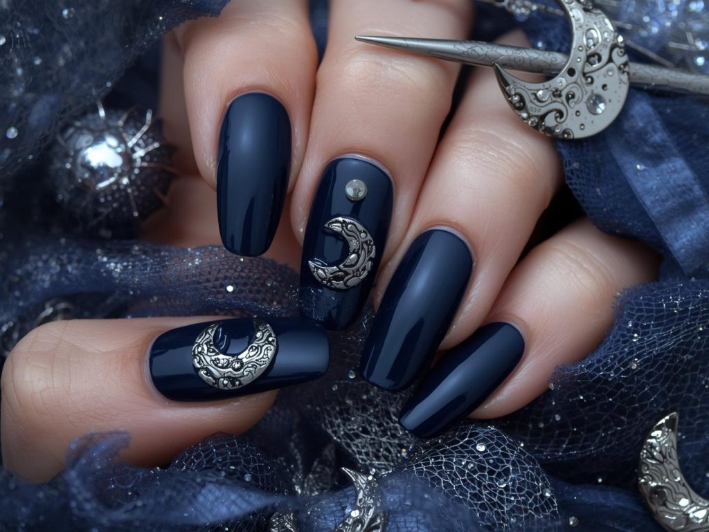 Deep indigo moon stud Halloween nail inspo with silver studs.