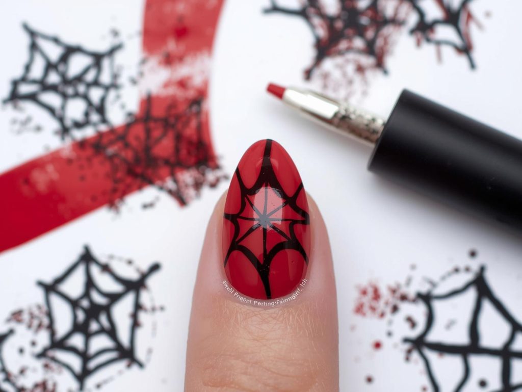 Deep red web line simple Halloween nail design with black lines.